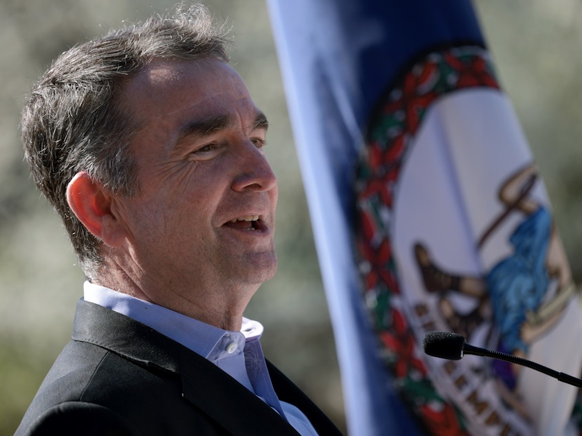 caption: Virginia Gov. Ralph Northam, here at a March event, has outlined a $700 million investment to boost broadband access and help close the digital divide for some of the state's poorest regions.