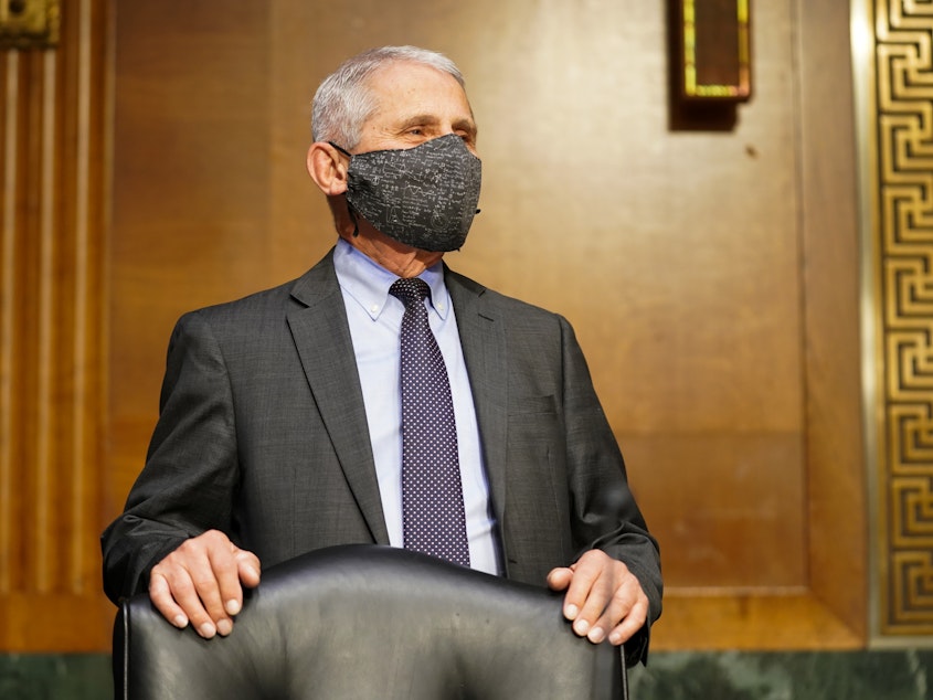caption: Dr. Anthony Fauci, director of the National Institute of Allergy and Infectious Diseases, has faced a barrage of conservative criticism and violent threats over the handling of the highly politicized coronavirus pandemic.