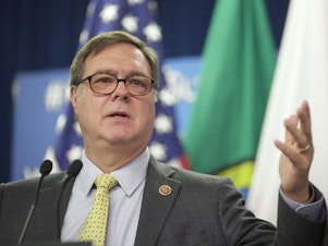 caption: U.S. Rep. Denny Heck (D) speaks during the Washington State Service Member for Life Transition Summit on Tuesday, Oct. 21, 2014 on Joint Base Lewis-McChord, Wash.