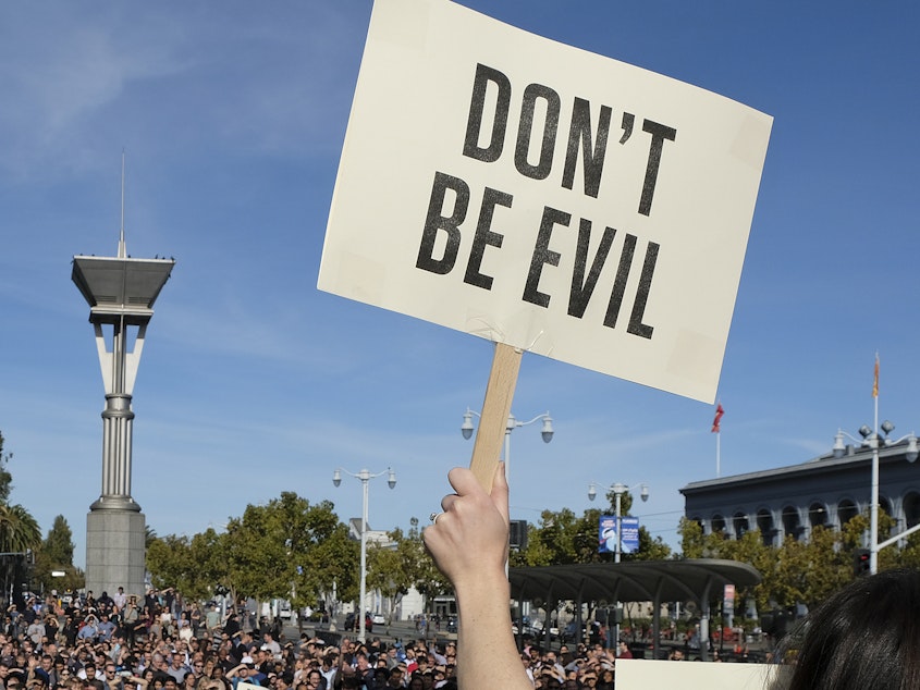 caption: Google employees fill Harry Bridges Plaza in front of the Ferry Building during a walkout Thursday, Nov. 1, 2018, in San Francisco.