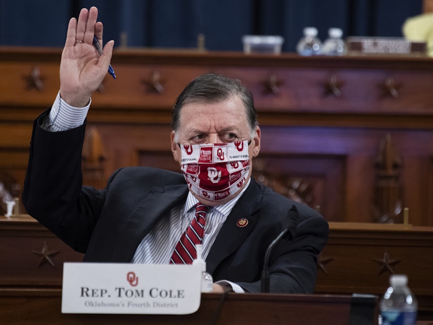 caption: "We are coming off a horrific event that resulted in six deaths," Rep. Tom Cole, R-Okla., said in his opening statement as House lawmakers began to debate a resolution to impeach President Trump.