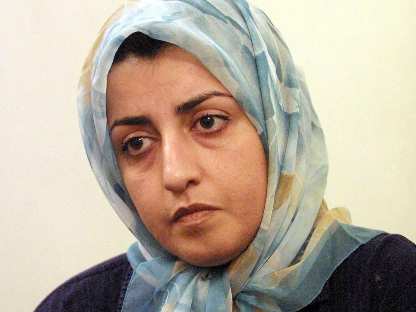 caption: Narges Mohammadi seen at her home in Tehran in 2001. Mohammadi, now imprisoned, was awarded the 2023 Nobel Peace Prize for her efforts to ensure women's rights in Iran.