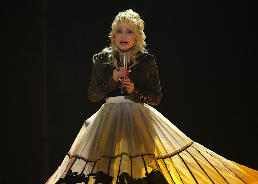 caption: Dolly Parton performs "World On Fire" at the 58th annual Academy of Country Music Awards on Thursday, May 11, 2023, at the Ford Center in Frisco, Texas.