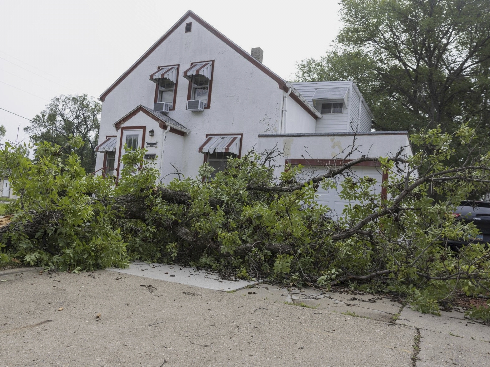 caption: Severe storms struck Bismarck, N.D., and other areas of the state early on Saturday, leaving at least three dead.