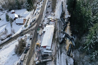 caption: The wreckage of a derailed oil train in Custer, Washington, on Dec. 23