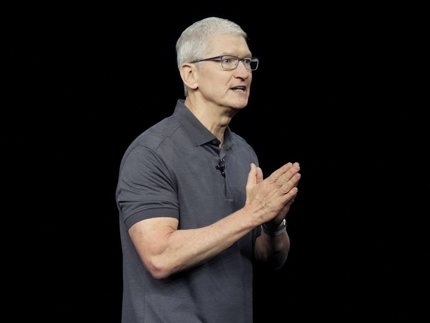 caption: Apple CEO Tim Cook speaks during an announcement of new products on the Apple campus in September 2023.