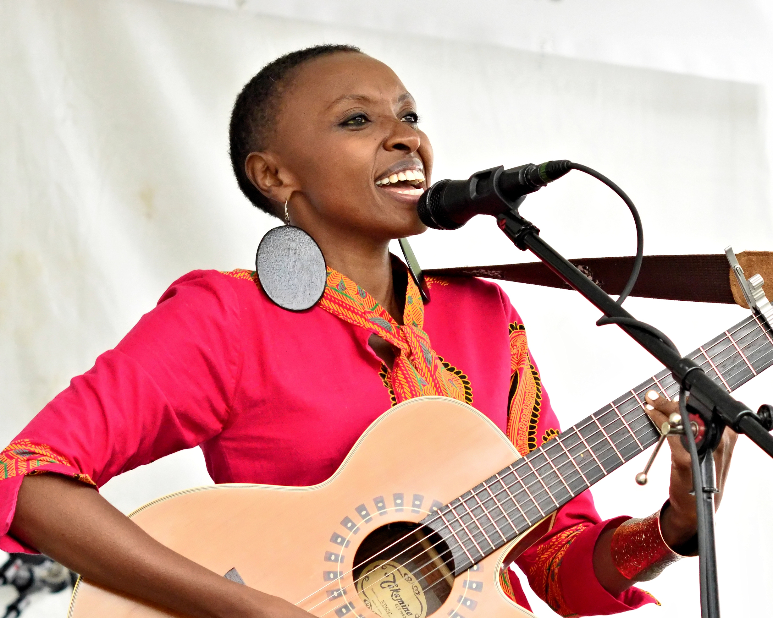 caption: Naomi Wachira performs her song 'African Girl' at the Northwest Folklife Festival at Seattle Center on Sunday, May 29, 2016.