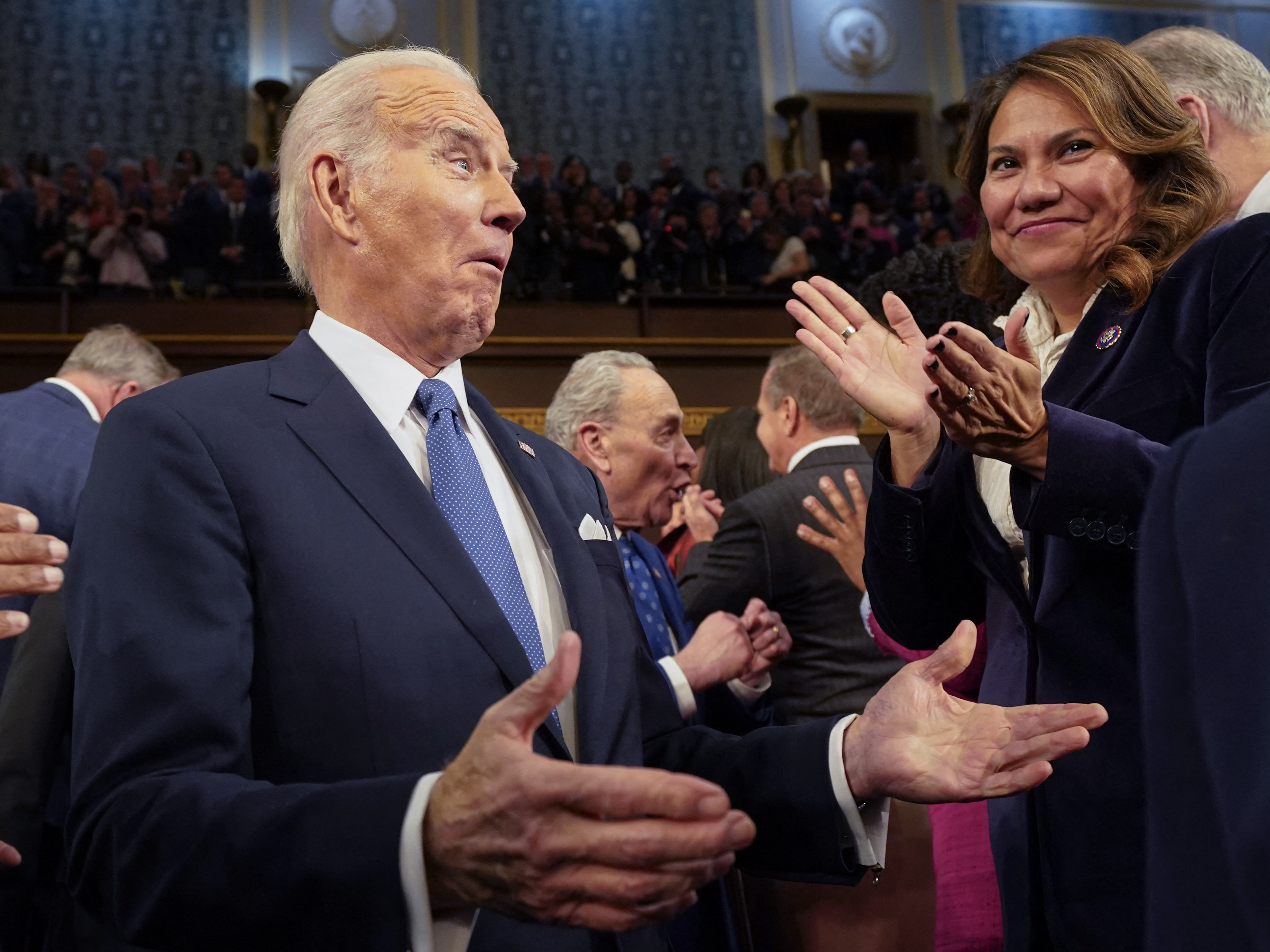 caption: President Biden arrives to deliver the State of the Union address in the House chamber on Feb. 7.