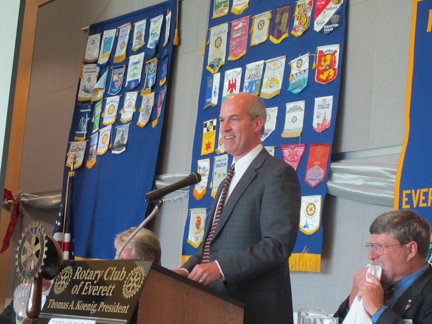 caption: Rep. Rick Larsen speaks to the Everett (Wash.) Rotary in the Grand Vista Ballroom of Naval Station Everett in late August 2011.