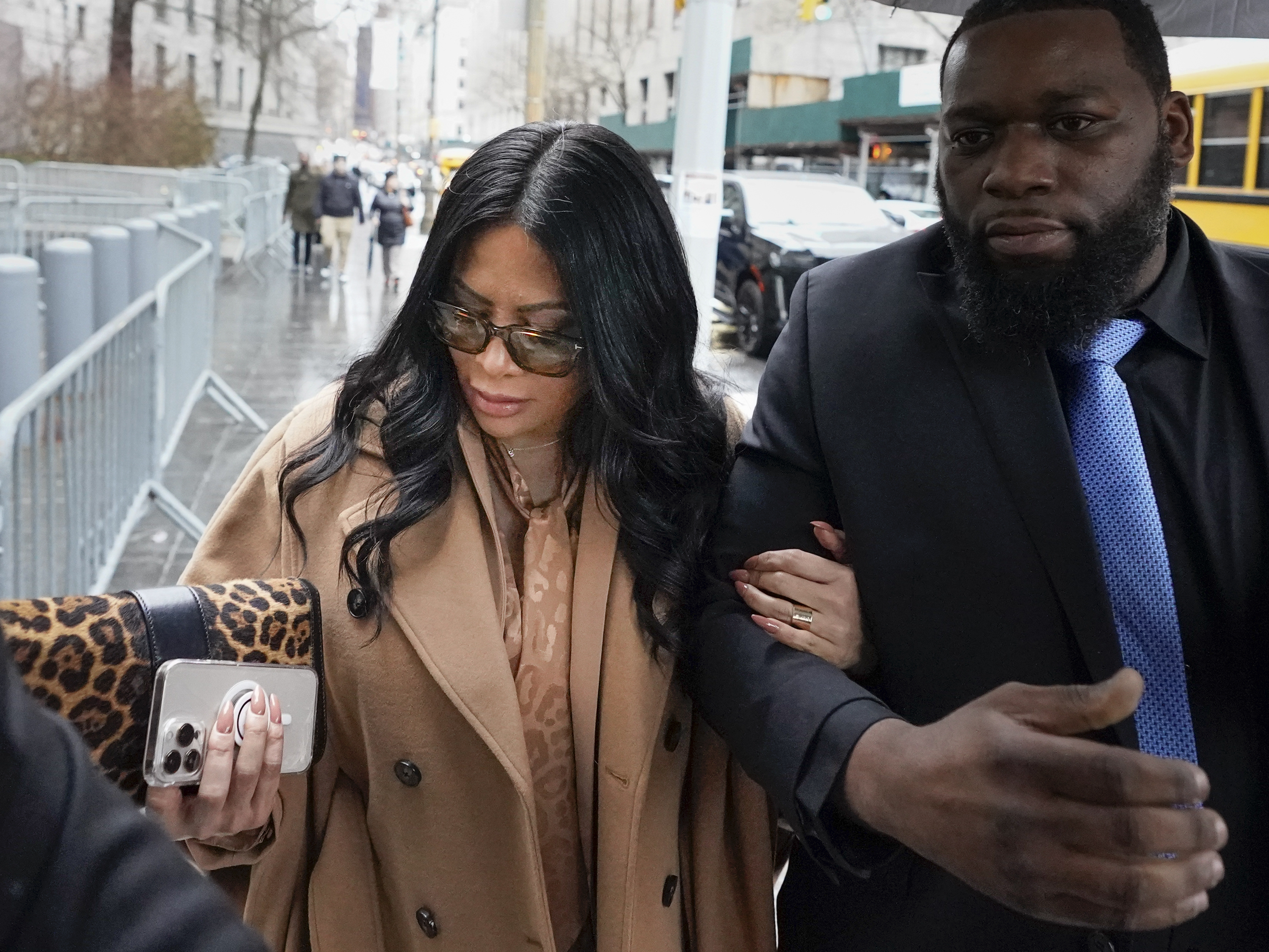 caption: Jennifer Shah arrives to federal court in New York, Friday, Jan. 6, 2023.