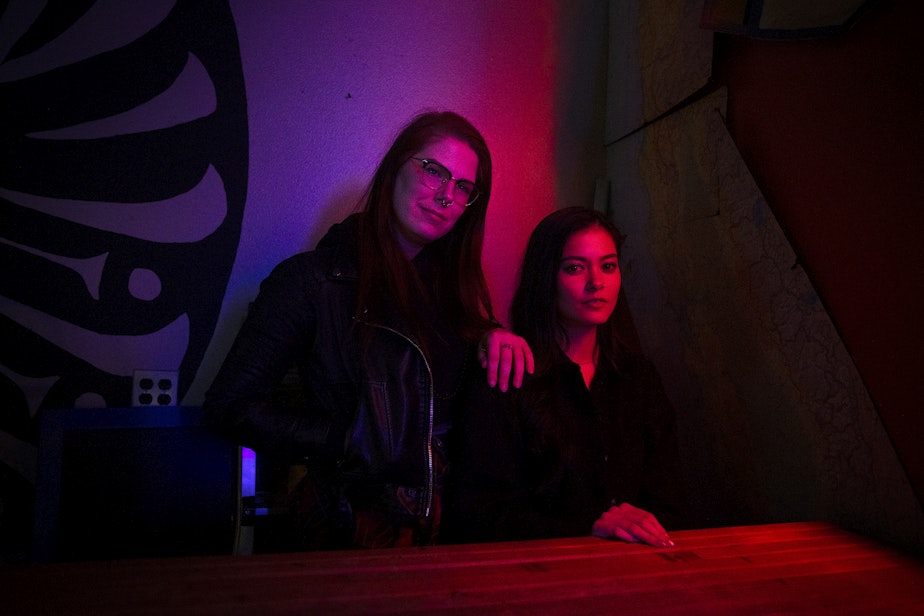 caption: Kasey Champion, left, and Madison Zack-Wu, right, are portrayed at the Thunderbird Tavern on Friday, February 9, 2024, in Seattle.