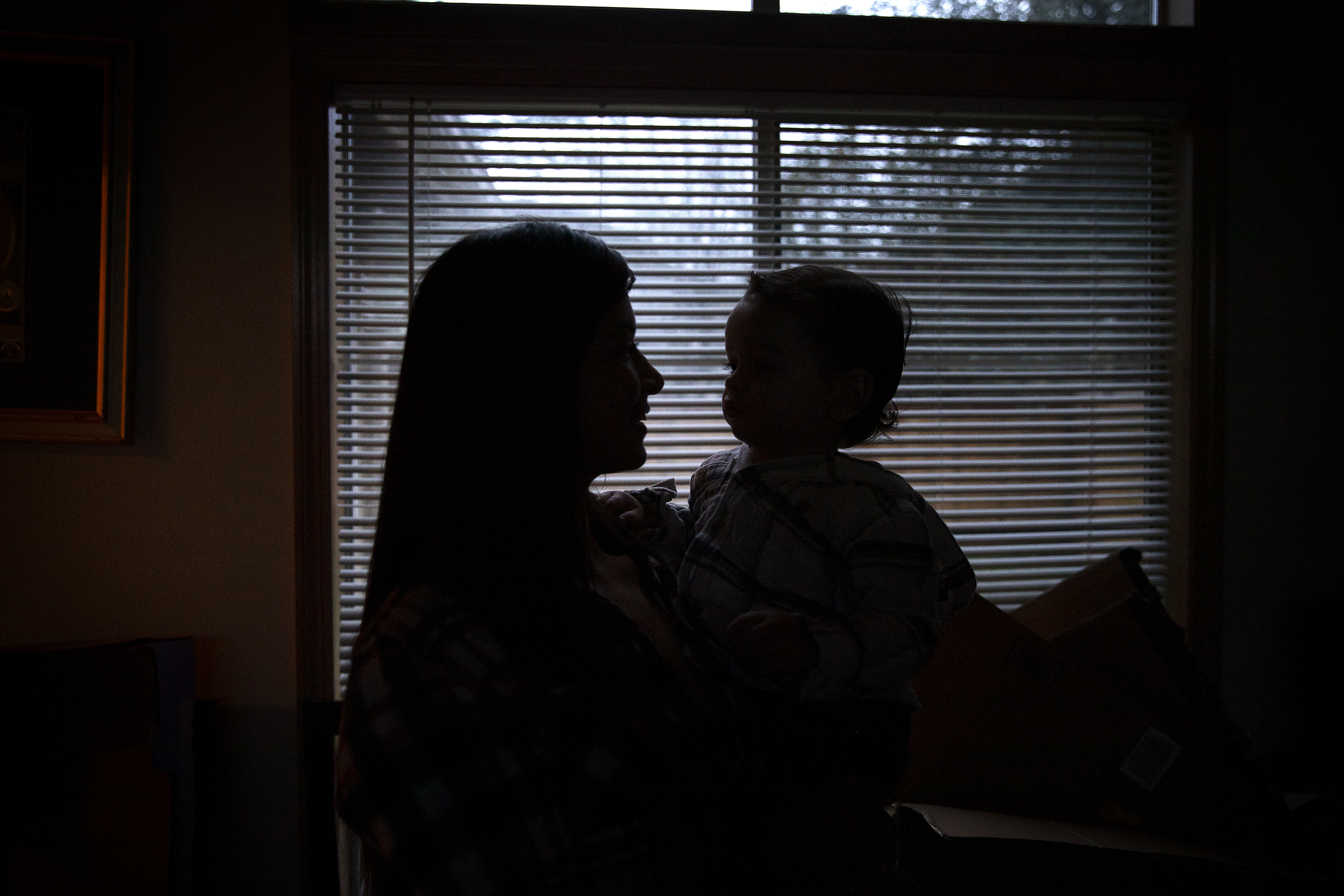 caption: Mariah is portrayed holding her son on Friday, November 21, 2025, at her home in Renton. 