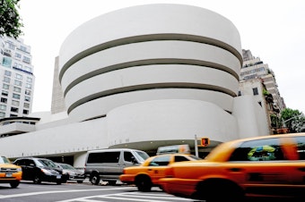 caption: The Guggenheim Museum, designed by Frank Lloyd Wright who developed the concept of "organic architecture," that a building should develop out of its surroundings.