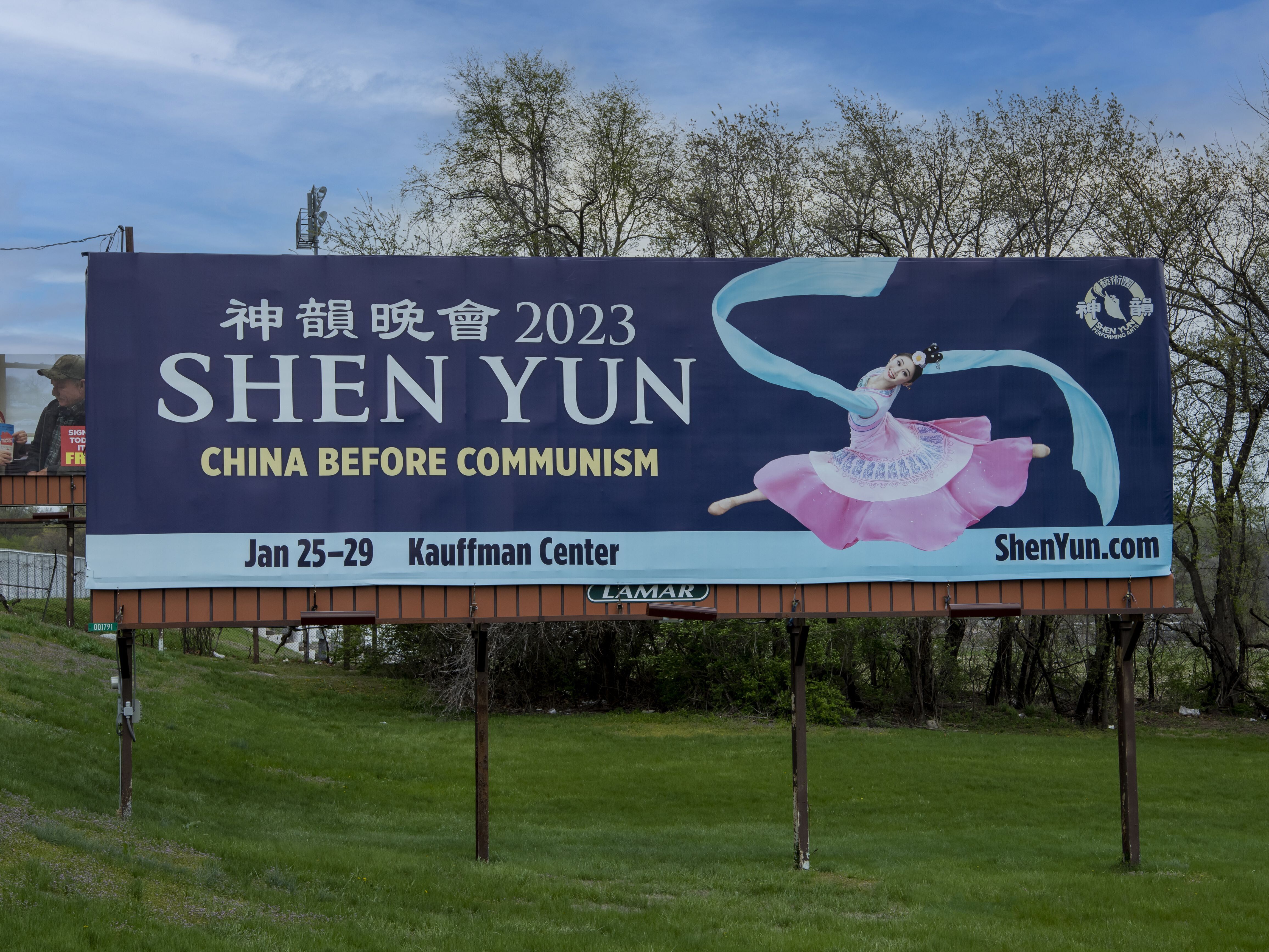caption: Shen Yun dance troupe on a billboard advertising an upcoming performance in Leavenworth, Kansas.