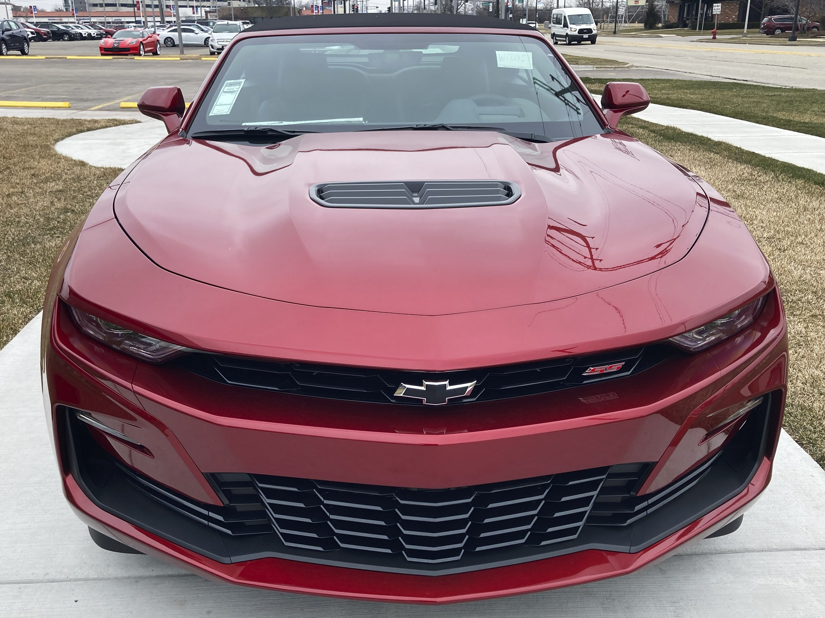 caption: A 2023 Chevy Camaro 2SS Convertible is seen at a dealership in Wheeling, Ill., on  Wednesday. General Motors said it will stop making current generation of the brawny muscle car early next year.