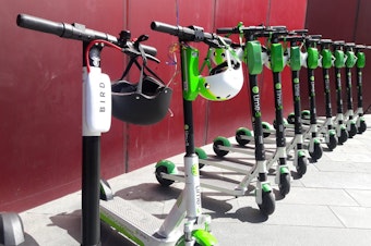 caption: Seattle's pilot program for electric scooters will roll out early next year.