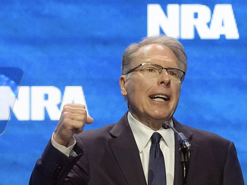 caption: Wayne LaPierre, CEO and executive vice-president of the National Rifle Association, addresses the NRA convention in Indianapolis in April.