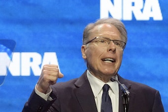 caption: Wayne LaPierre, CEO and executive vice-president of the National Rifle Association, addresses the NRA convention in Indianapolis in April.