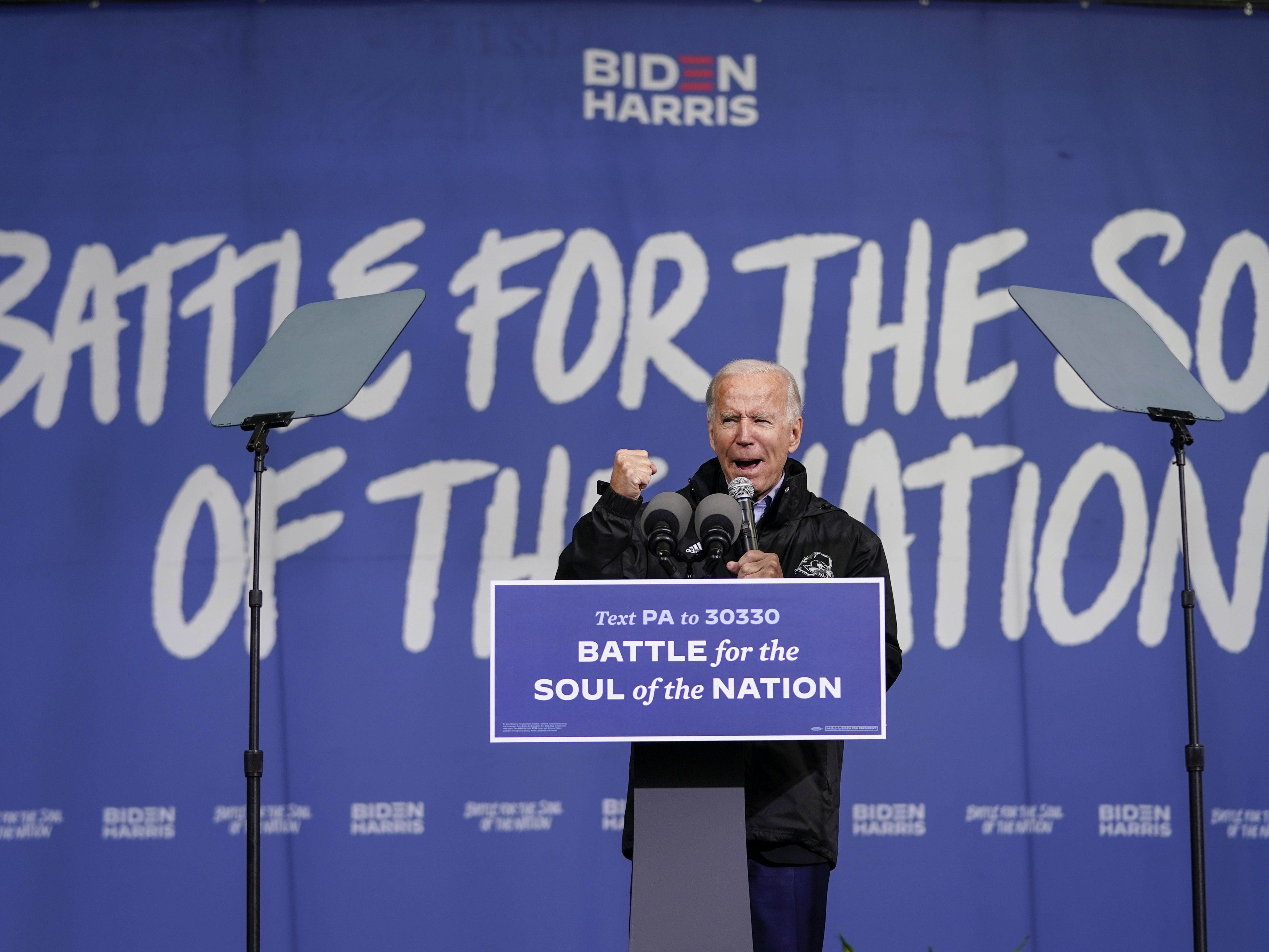 caption: Democratic presidential nominee Joe Biden speaks at an event Sunday at Sharon Baptist Church in Philadelphia.