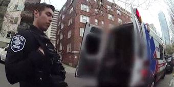 caption: A screenshot of a body camera video during a call to June's apartment. June is a frequent 911 caller in Seattle.