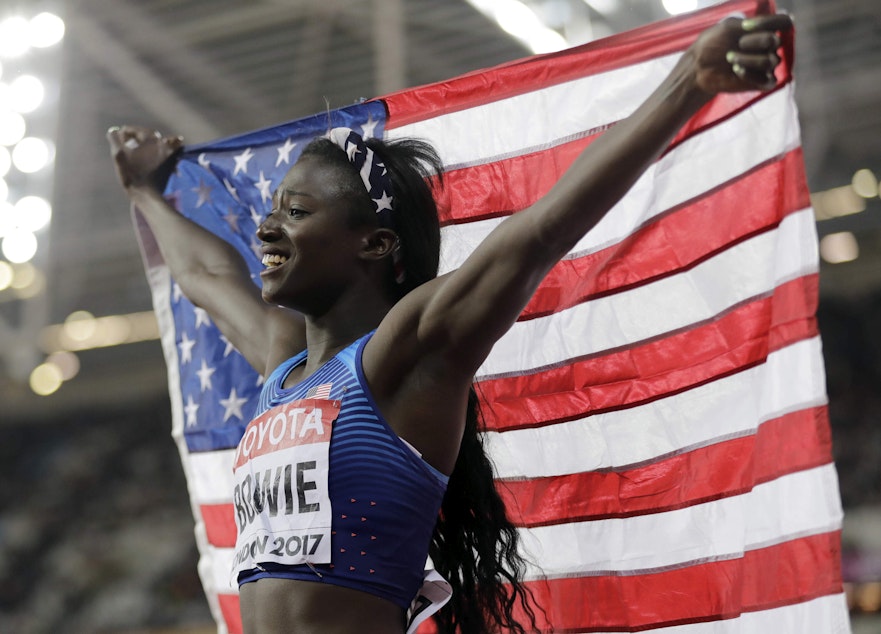 caption: United States' Tori Bowie celebrates after winning the gold medal in the Women's 100m final during the World Athletics Championships in London Sunday, Aug. 6, 2017. (David J. Phillip/AP)