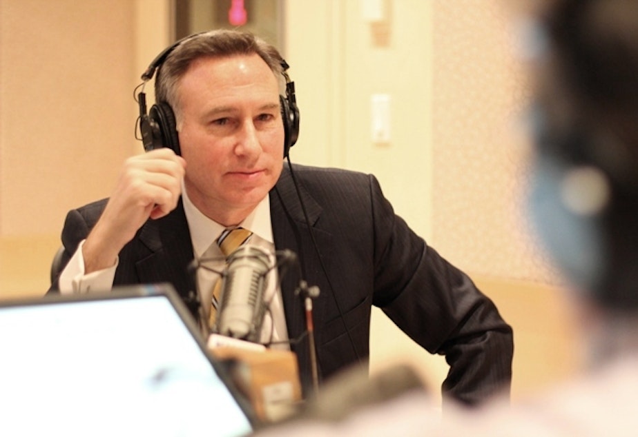 caption: Dow Constantine in the KUOW studios. 