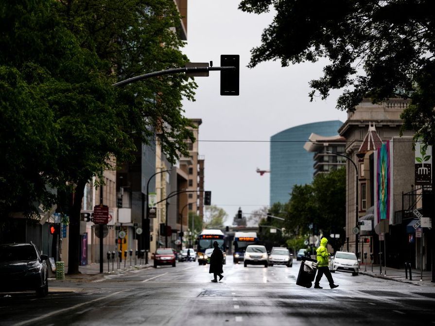 caption: Two men have been indicted for allegedly planning an attack on Democratic Party headquarters in Sacramento, Calif., pictured here in April 2020.