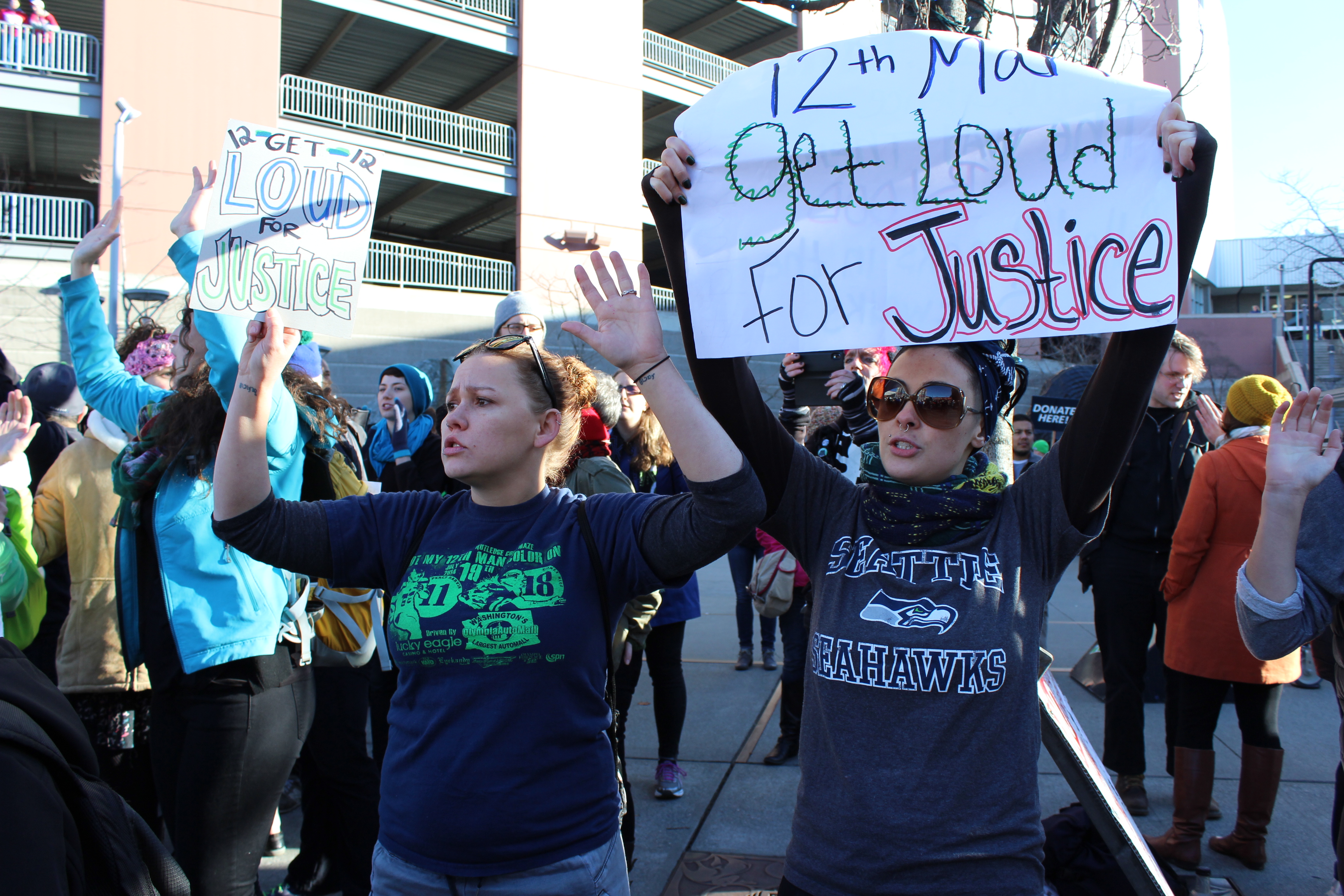 caption: Protesters outside CenturyLink Field before start of Seahawks game Sunday, December 14, 2014.