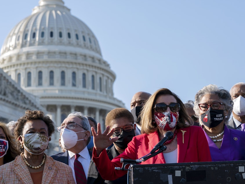 caption: House Speaker Nancy Pelosi speaks alongside members of the Congressional Black Caucus on Tuesday following the verdict against former Minneapolis police officer Derek Chauvin for the murder of George Floyd.
