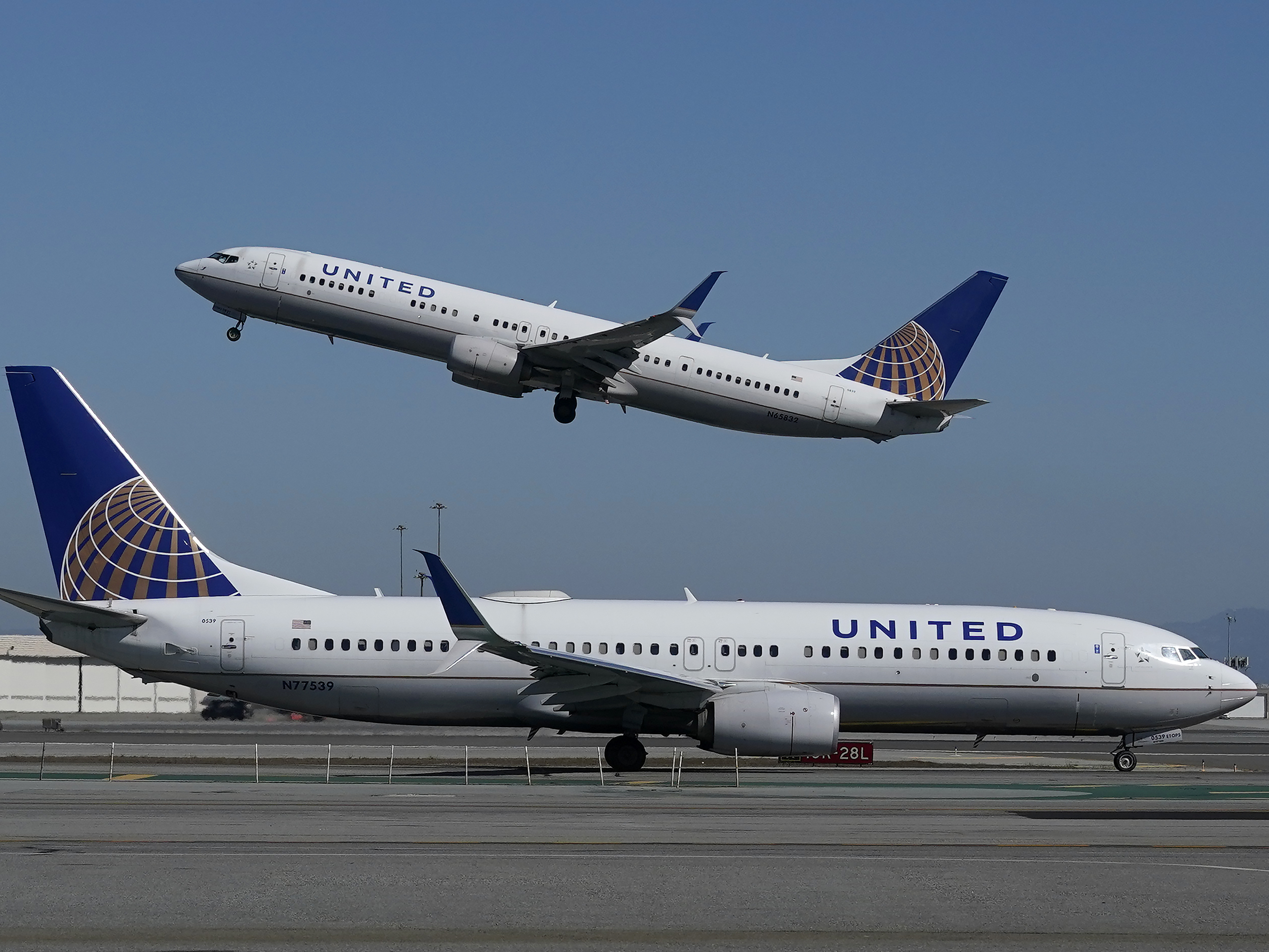 caption: United Airlines is offering customers who've received COVID-19 vaccines the chance to win free flights for a year.