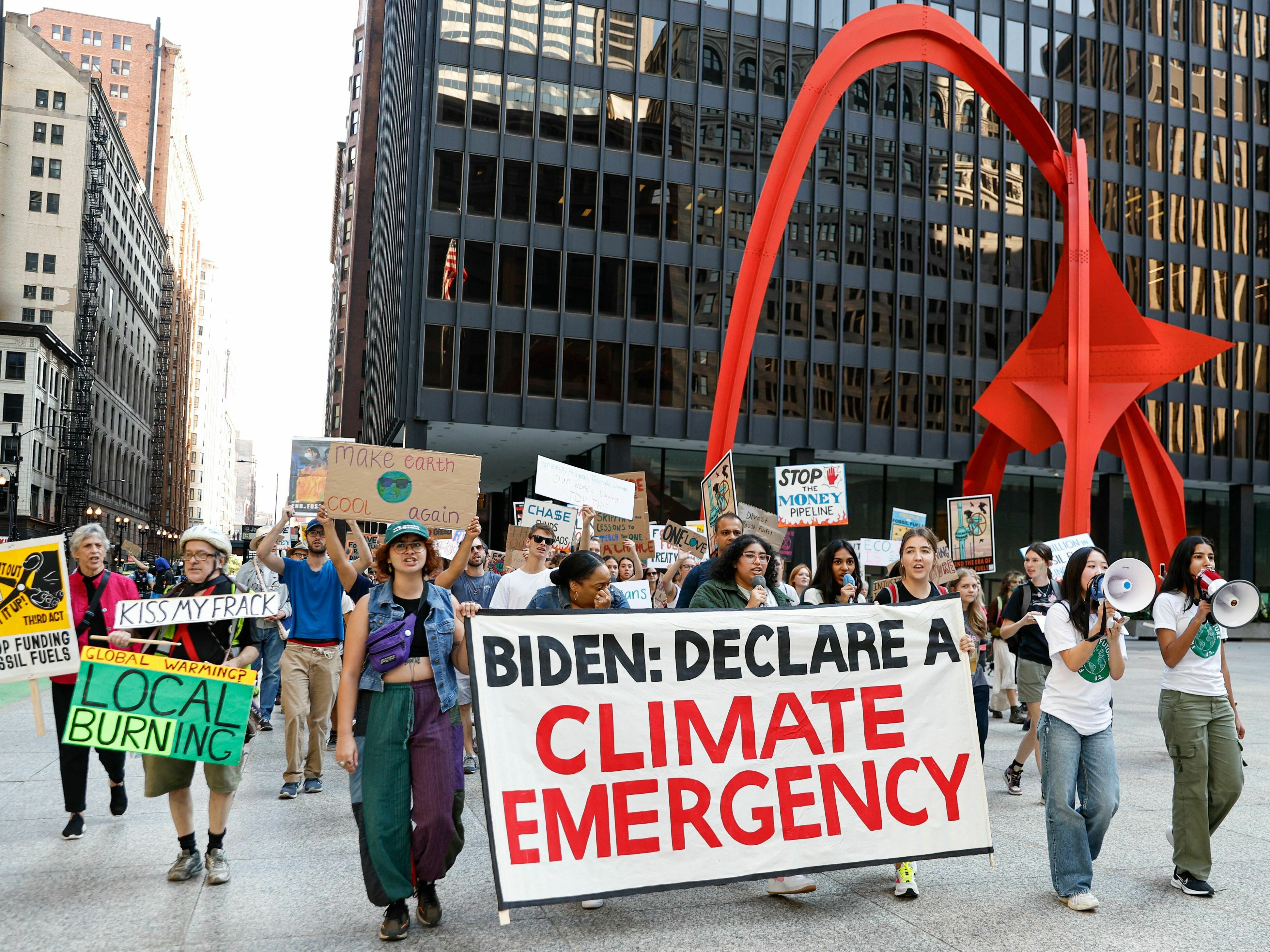 caption: Environmental activists march during the Global Climate Strike in downtown Chicago on Sept. 15, 2023. Local groups across the United States are gathering to call for an end to the era of fossil fuels.