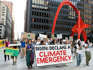 caption: Environmental activists march during the Global Climate Strike in downtown Chicago on Sept. 15, 2023. Local groups across the United States are gathering to call for an end to the era of fossil fuels.