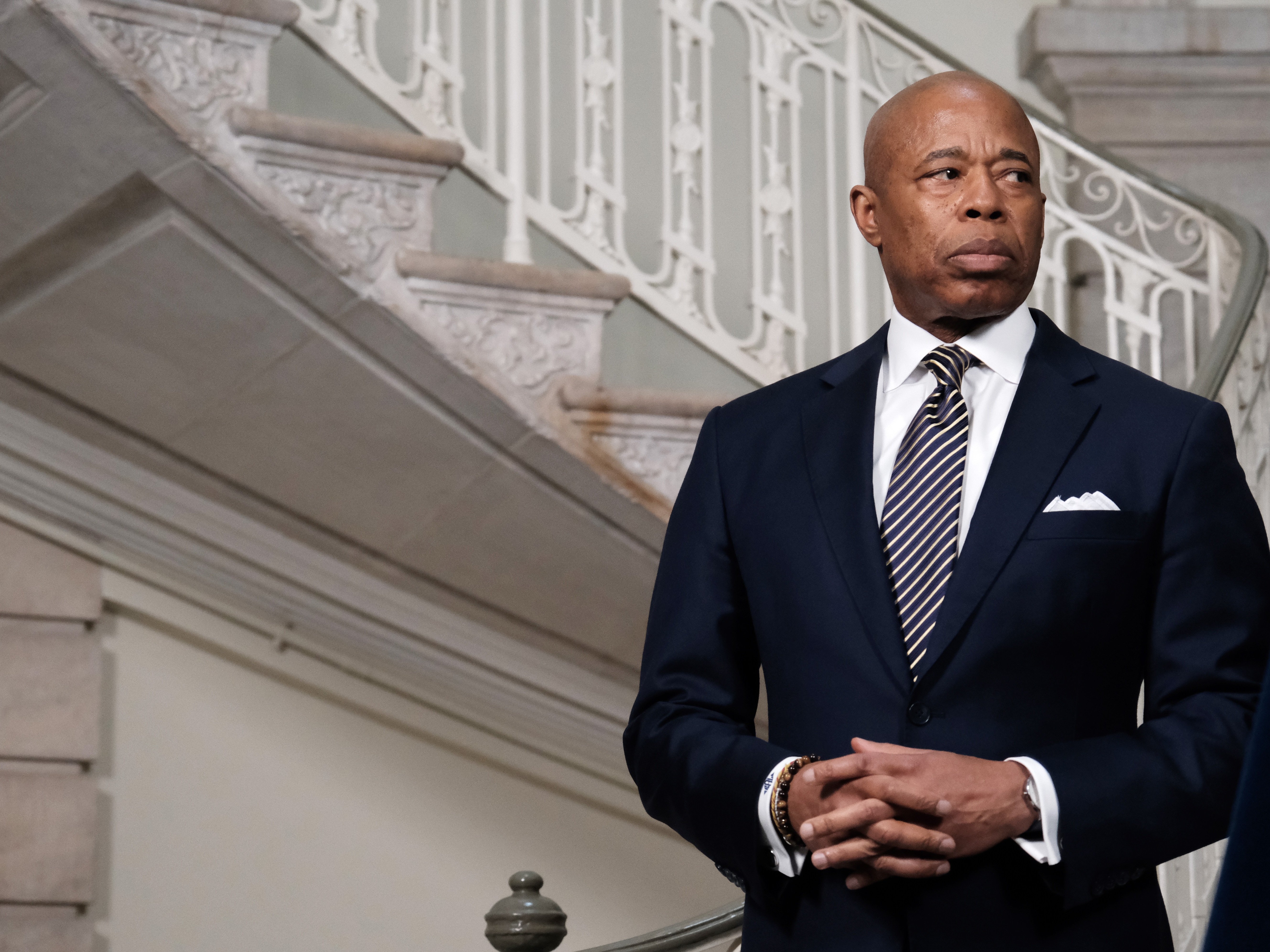 caption: Mayor Eric Adams has signaled a growing openness to partnering with the Trump administration on immigration sweeps and other policy initiatives. A U.S. Justice Department memo urged that criminal charges against Adams be dropped in part so that he could focus on dealing with undocumented migrants in New York City.