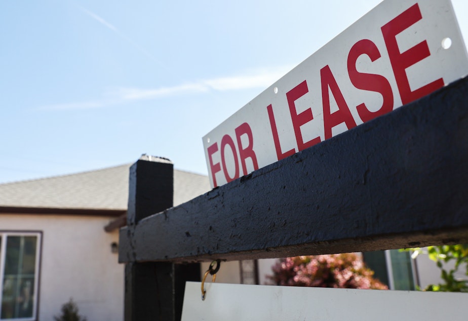 caption: The soaring costs of basic necessities such as food and housing are disproportionately hitting people with lower incomes. Here, a house is available for rent in Los Angeles on March 15.