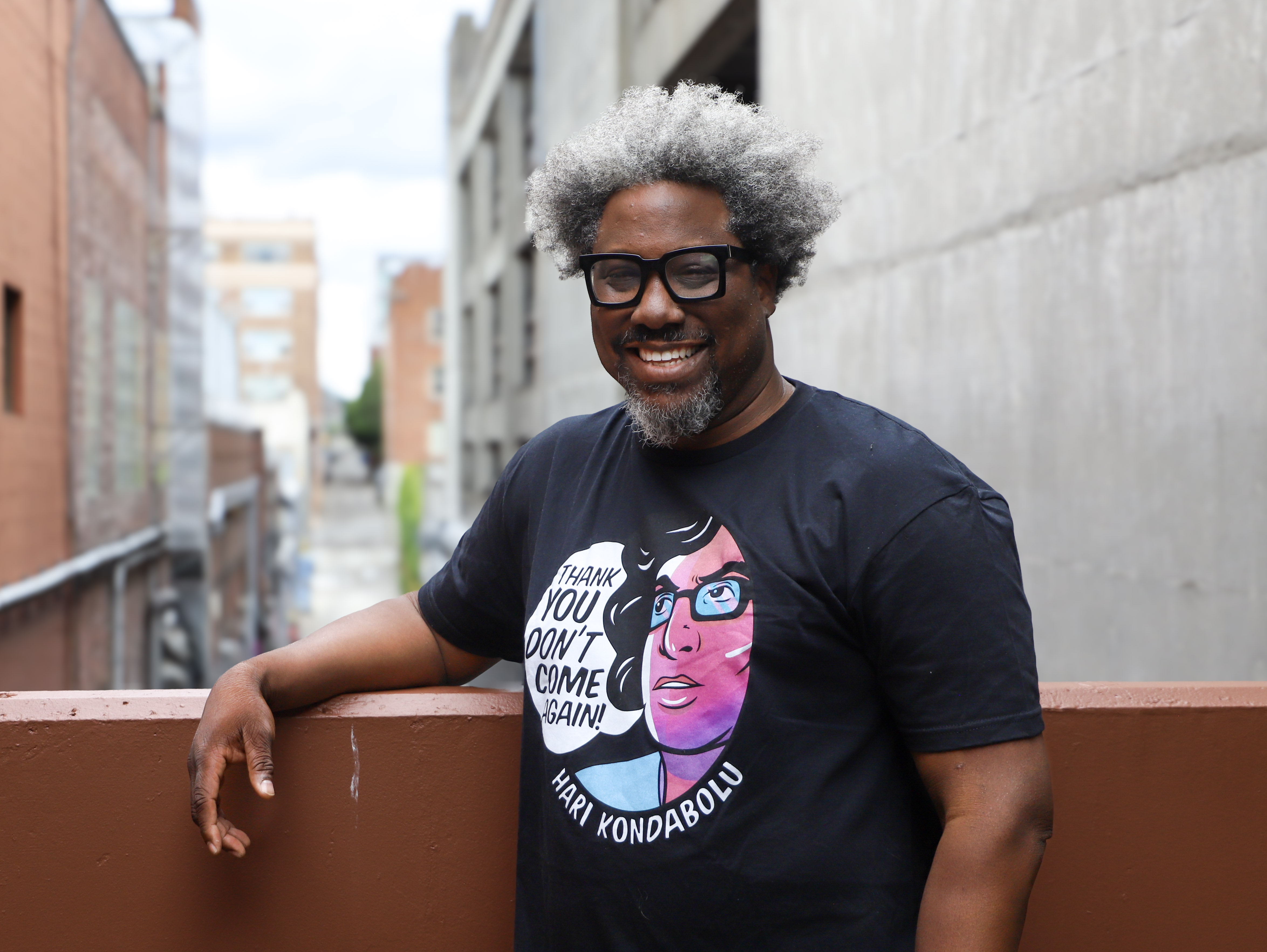 caption: American stand-up comic and television host, W. Kamau Bell during his visit to KUOW's studios in Seattle. June 27, 2025.