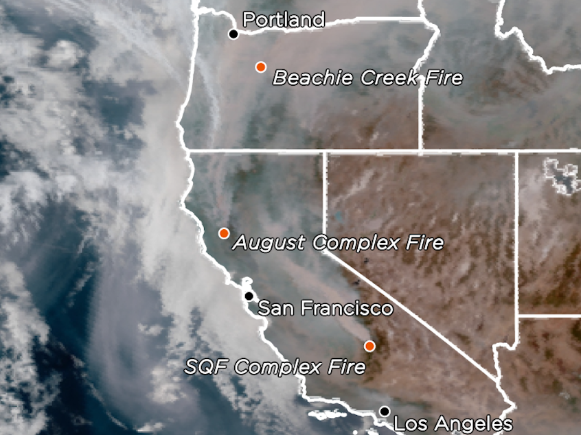 caption: A satellite image shows smoke and some of the major fires on Sept. 13, 2020.