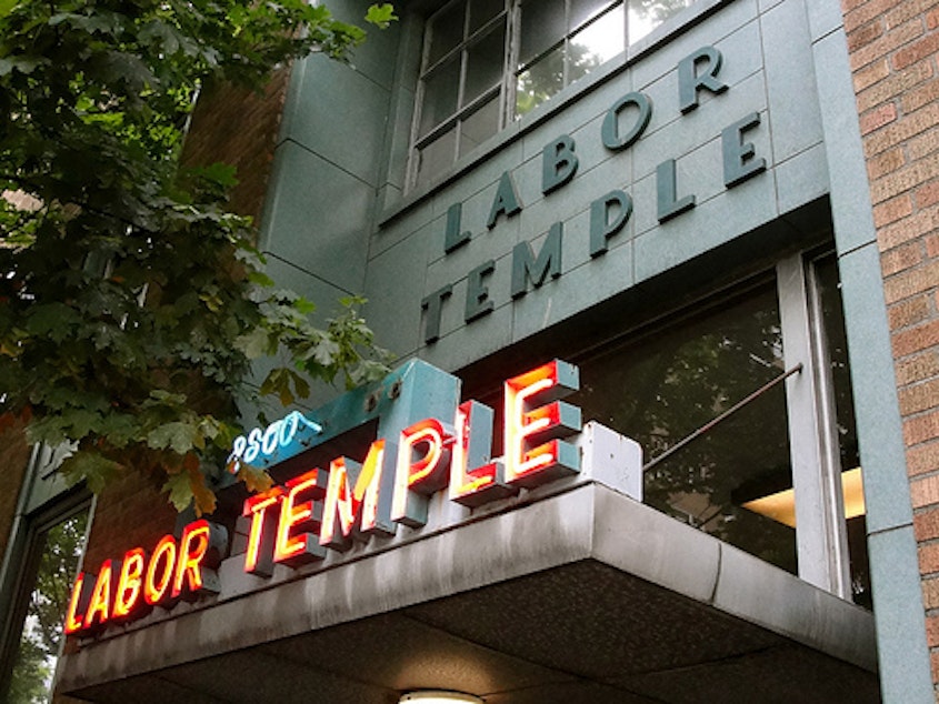 caption: Seattle's Labor Temple, with its distinctive neon sign
