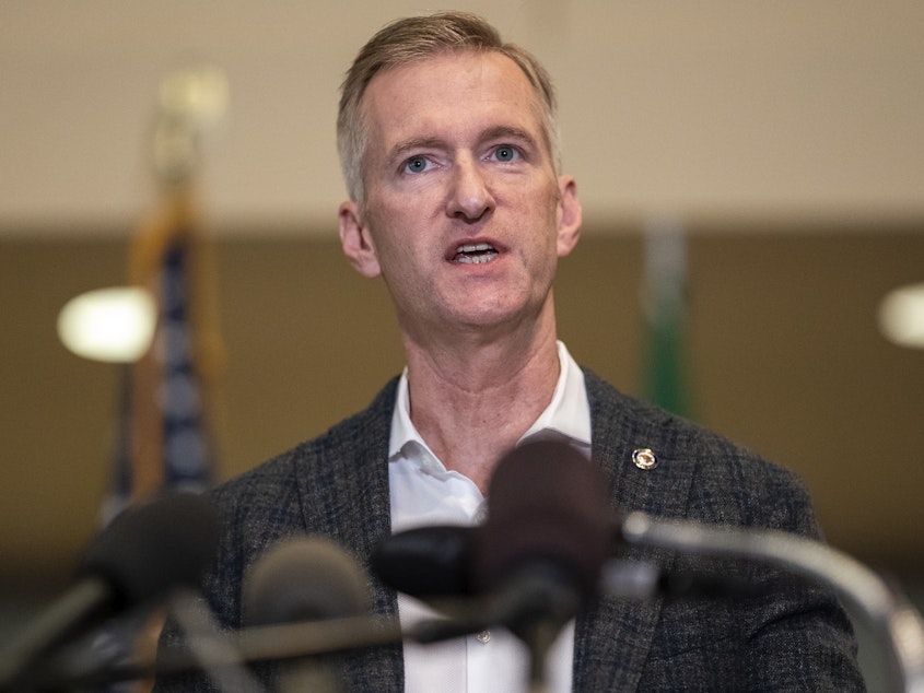 caption: "Effective immediately and until further notice, I'm directing the Portland Police Bureau to end the use of gas for crowd control," Portland Mayor Ted Wheeler announced Thursday. He's seen here speaking at City Hall in late August.