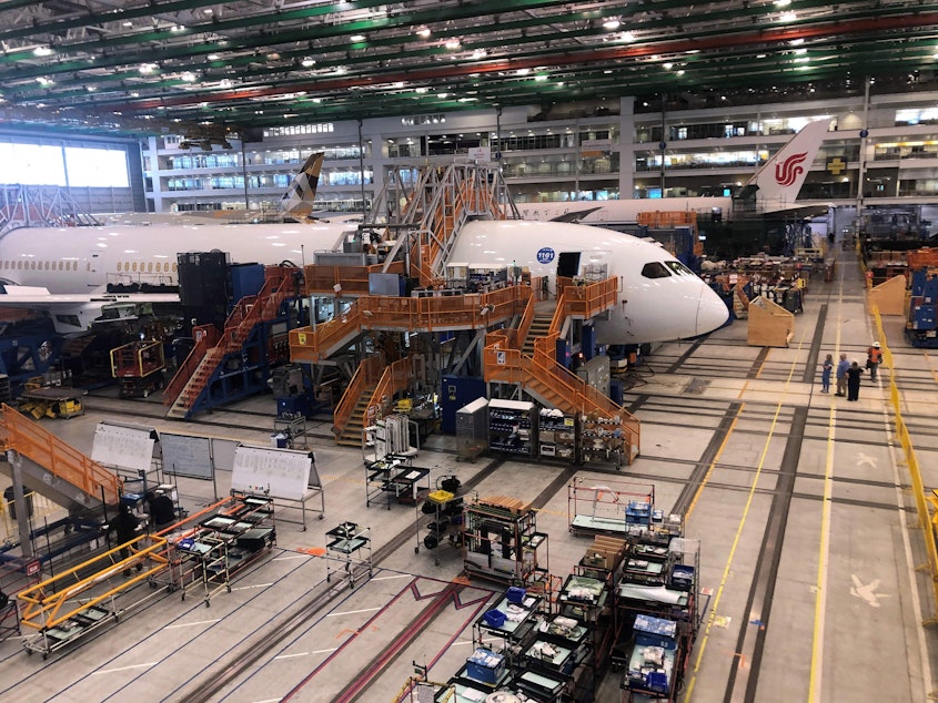caption: Boeing 787 Dreamliners are built at the aviation company's North Charleston, S.C., assembly plant in 2023. John Barnett had alleged that Boeing's manufacturing practices had declined  and that managers pressured workers not to document potential defects and problems.