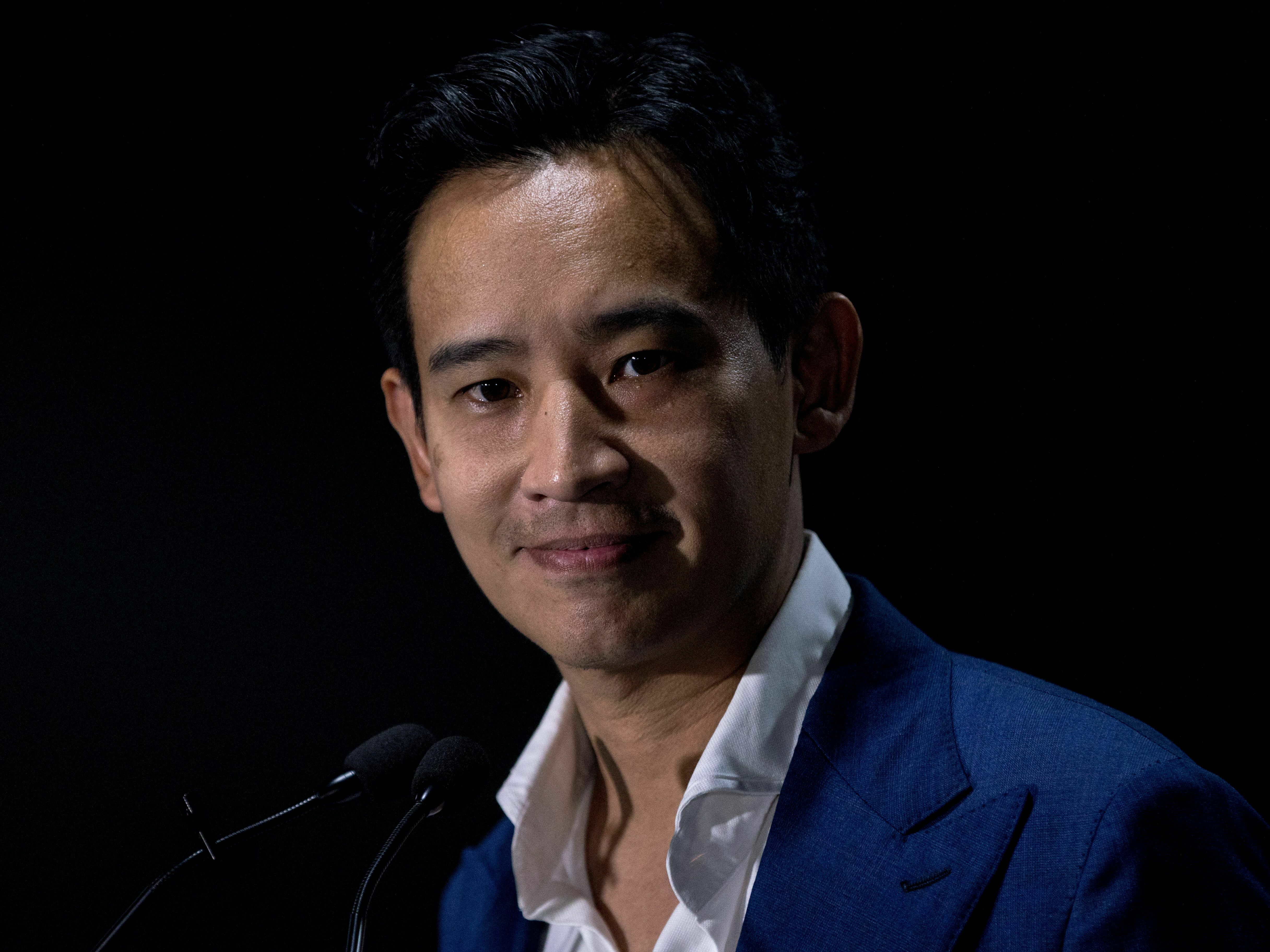 caption: Move Forward Party leader and prime ministerial candidate Pita Limjaroenrat gives a press conference at the party headquarters in Bangkok on May 14 after polls closed in Thailand's general election.