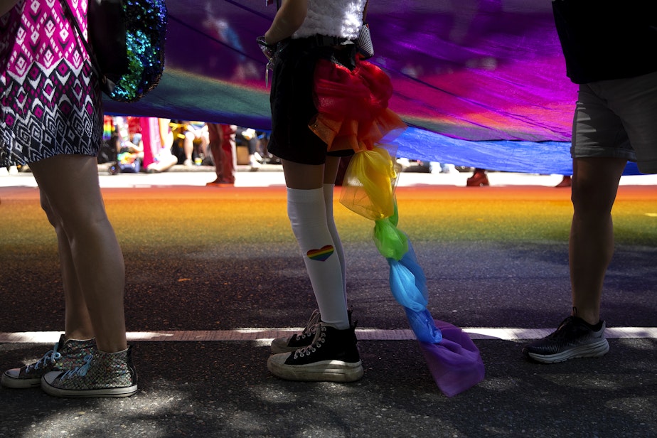 caption: Thousands gathered for the Seattle Pride Parade on Sunday, June 25, 2023, in downtown Seattle. 