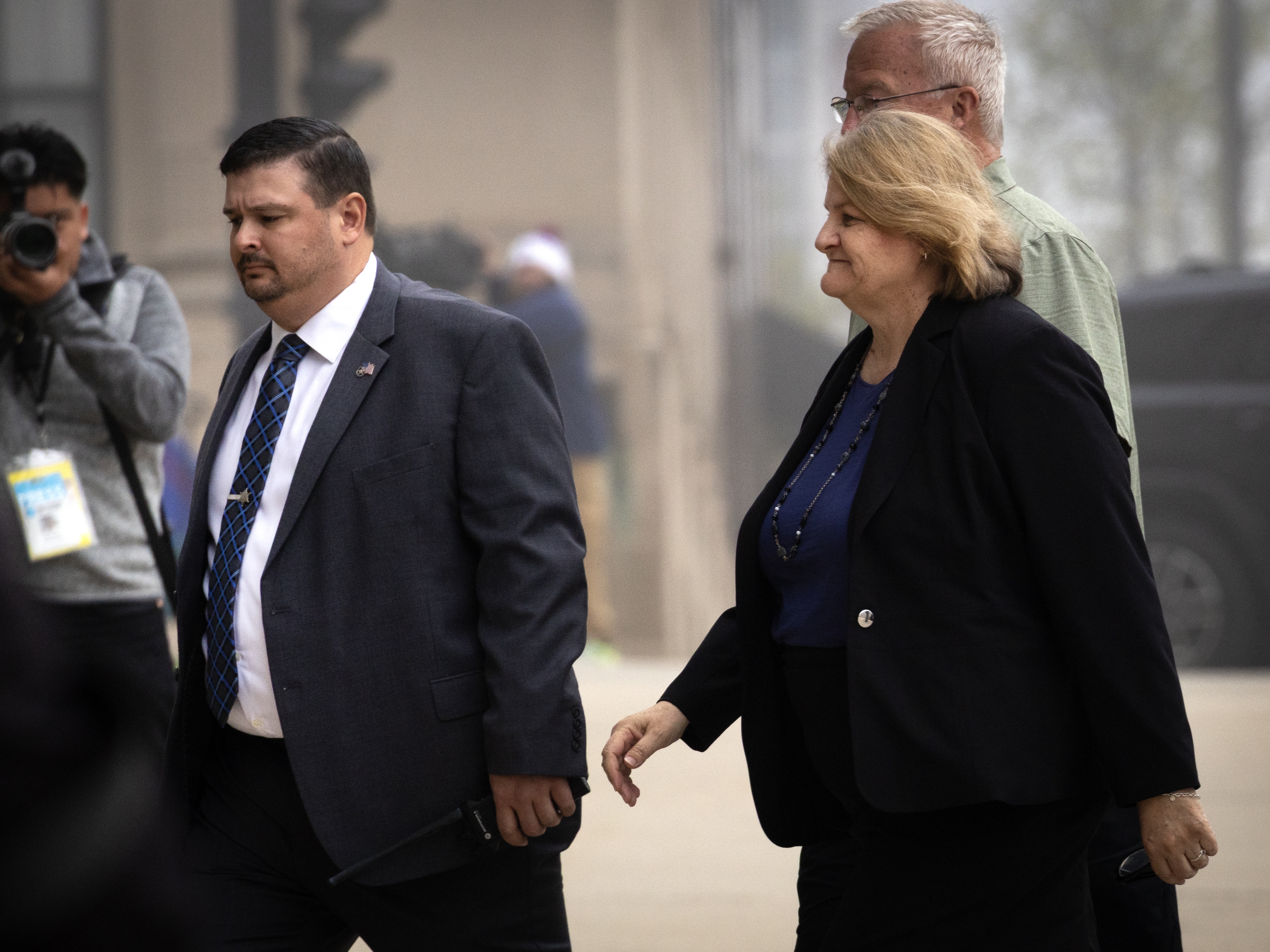 caption: Milwaukee County Circuit Judge Hannah Dugan walks into the federal courthouse in Milwaukee on May 15, 2025. Dugan has been charged with trying to help Eduardo Flores-Ruiz, an undocumented immigrant, elude federal arrest while he was making an appearance in her courtroom on April 18.