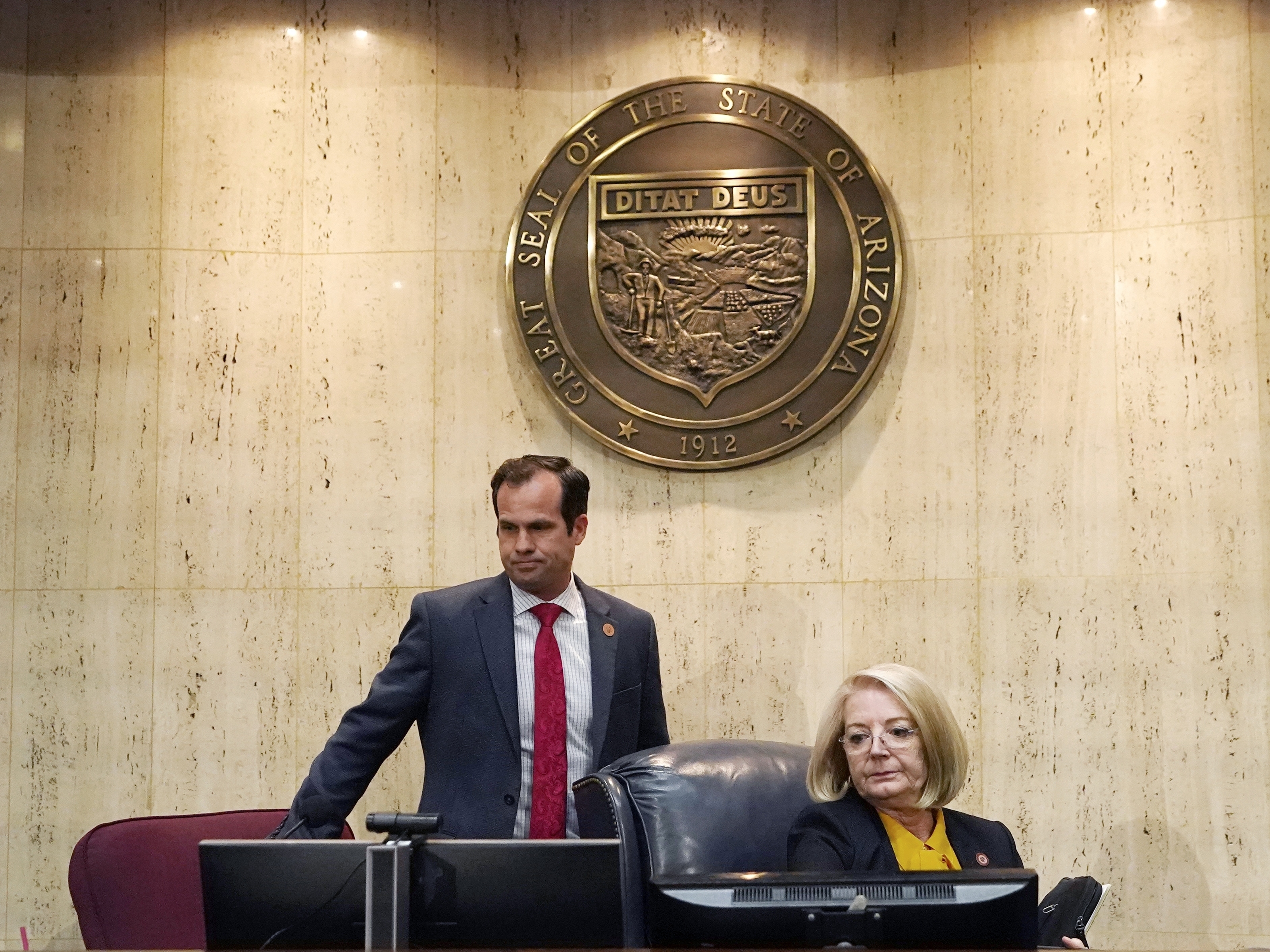 caption: Then-Arizona state Senate President Karen Fann, right, is joined by then-Sen. Warren Petersen prior to a 2021 hearing on a review of the 2020 election results in Maricopa County.