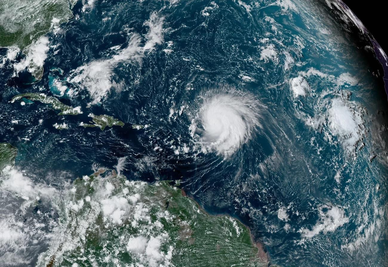 caption: Hurricane Lee crosses the Atlantic Ocean in 2023. The National Hurricane Center predicts at least 8 hurricanes are expected to form in the Atlantic this year.

