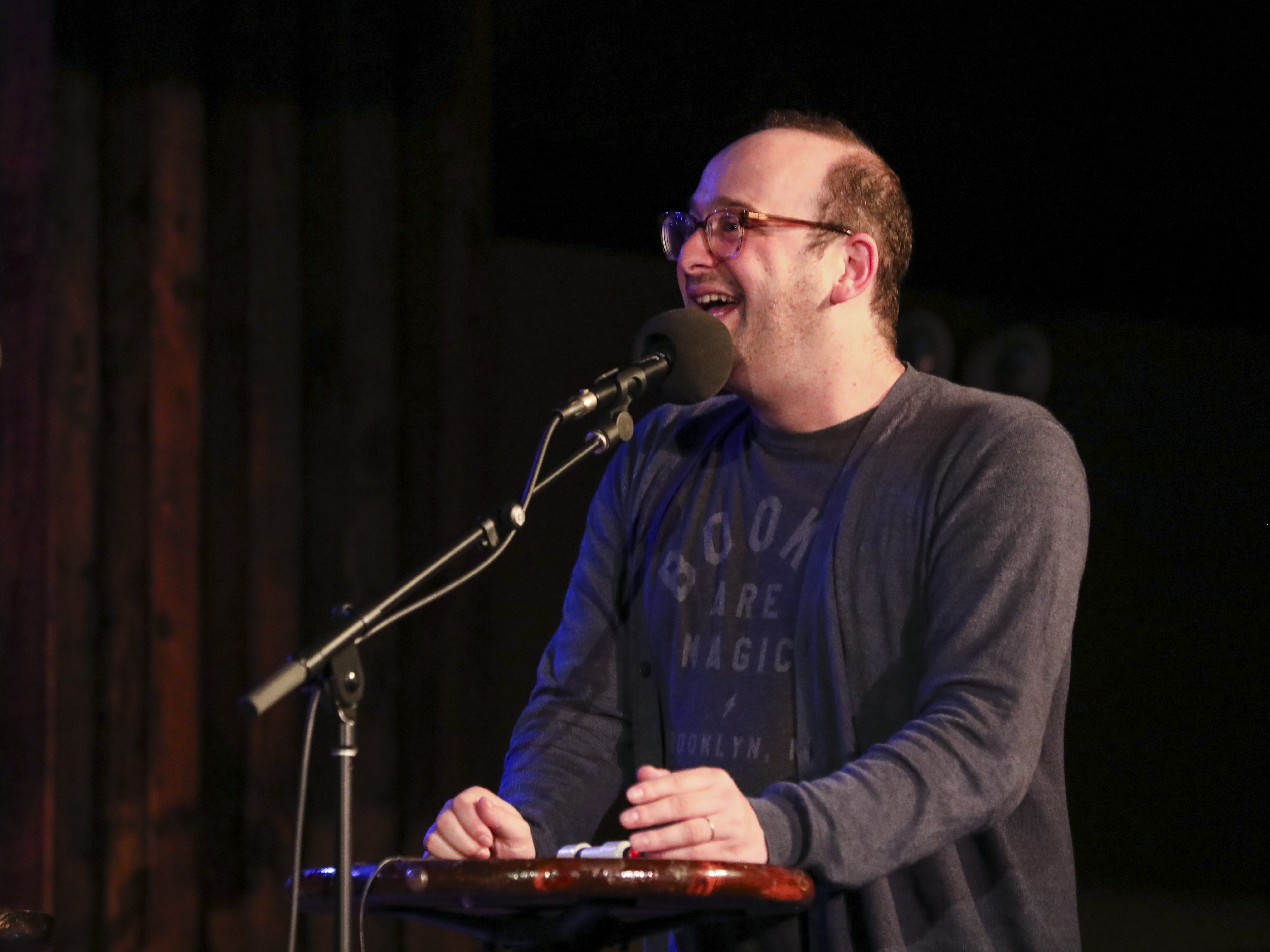 caption: Josh Gondelman appears on Ask Me Another at the Bell House in Brooklyn, New York.