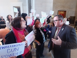 caption: In the Tennessee capitol, state Rep. Matthew Hill took heat from abortion-rights proponents last month who had gathered to protest a bill he favored that would ban abortions after about six weeks' pregnancy. That legislation was eventually thwarted in the Tennessee senate, however, when some of his fellow Republicans voted it down, fearing the high cost of court challenges.