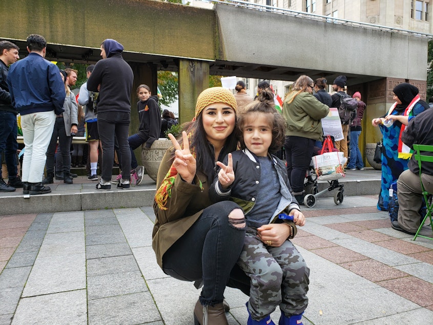 caption: Taban Abdulkadr and her son, Abdullah, named after Abdullah Öcalan, a founder of the Kurdistan Workers' Party.