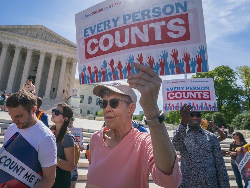 caption: Demonstrators rally outside the U.S. Supreme Court in April 2019 to protest against the Trump administration's efforts to add the now-blocked citizenship question to the 2020 census.