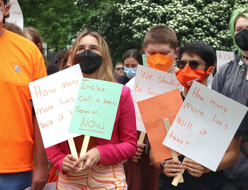 caption: Students rally calling for an end to preventable gun violence. 
Seattle Student Union President Natalya McConnel (left) and union member Chetan Soni