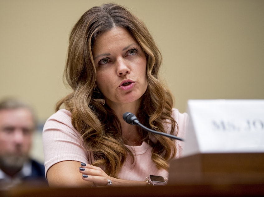 caption: Ruby Johnson, whose daughter was recently hospitalized with a respiratory illness from vaping, testified before a House Oversight subcommittee hearing on lung disease and e-cigarettes on Capitol Hill Tuesday.